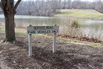 The wood service road park vehicle sign.
