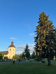 Fototapeta na wymiar Beautiful small white church in the small Scandinavian town 