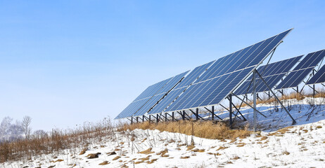 Solar cells Photoelectric cells on a bright, sunny, frosty winter day in the countryside. Solar...