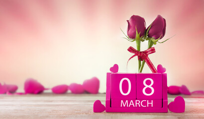 International women's day concept. Wooden calendar with the date of March 08 and beautiful roses.