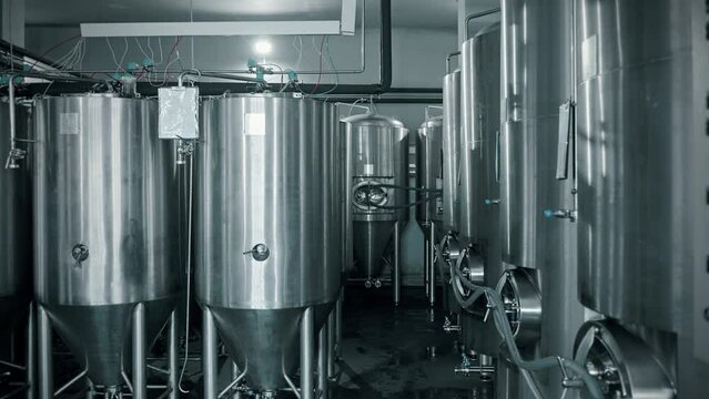 workshop of modern brewery, cylindrically-conical fermenter for fermenting beer