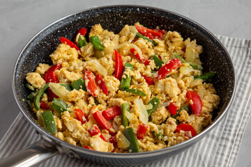 Homemade Scrambled Peppers and Eggs in a Pan, side view.