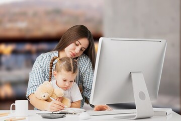 Happy young parent with child work on computer