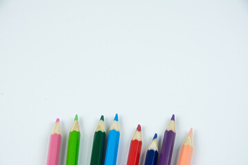 Group of crayons upon a white background