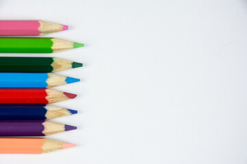 Group of crayons upon a white background