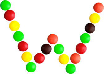 Multicolored candy spelling out the letter "W"