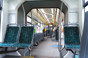 Interior design of a modern bus for passenger transportation in the city.