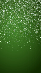 Snowy christmas background. Subtle flying snow flakes and stars on christmas green background. Delicate sweet snowy christmas. Vertical vector illustration.