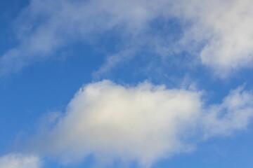 Beautiful view of white clouds on blue sky background. 