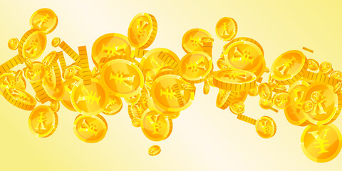 Chinese yuan coins falling. Scattered gold CNY