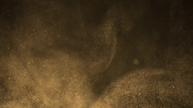 Dynamic yellow sandstorm particles fly in the air