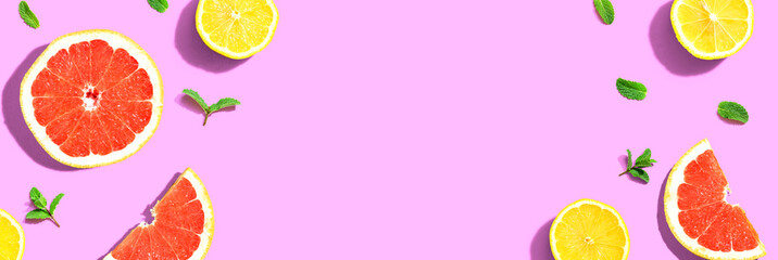 Fresh grapefruits and lemons overhead view - flat lay