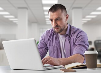 Busy Businessman Working in office on computer