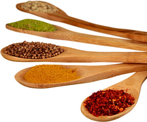 Spices On Wooden Spoons - Isolated