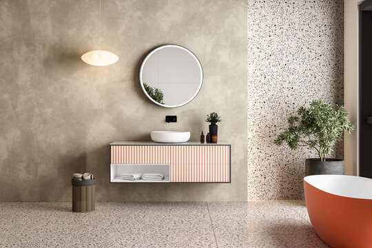 Modern minimalist bathroom interior, modern pink bathroom cabinet, white sink, wooden vanity, interior plants, bathroom accessories, orange-white bathtub, concrete wall, terrazzo flooring.3d rendering