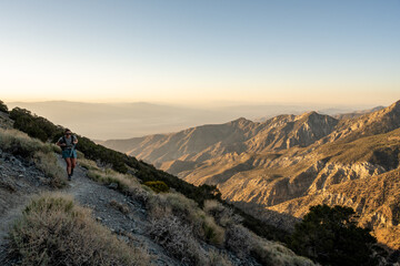 HIker Climbing Steep Trail to Telescope Peak In Death Valley