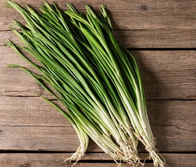 fresh green onion on wooden background