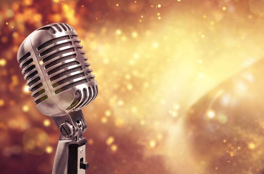 retro steel microphone on festival background