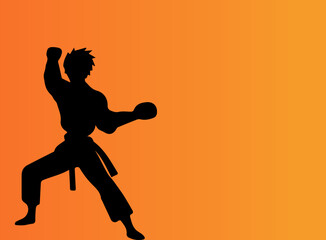 Fototapeta na wymiar Martial arts silhouette in orange background