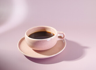 Pink Perfection: A Vintage Mid-Century Modern Coffee Cup with Black Espresso