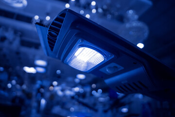 Solar-powered street lamp at the showroom of a large store
