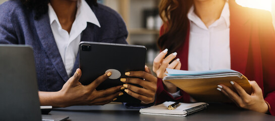 Entrepreneurs and business people conference in modern meeting room, happy multiracial coworkers have fun cooperating working together at office meeting, asian teamwork concept