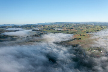 Morning fog over farmland