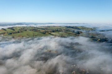 Morning fog over farmland