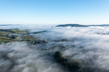 Morning fog over farmland