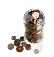 Different Currencies Coins In Jar - Isolated