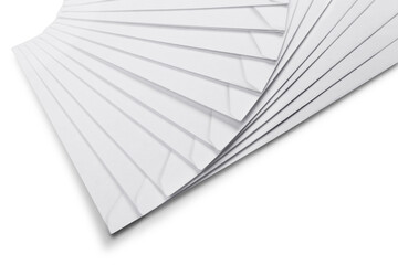 Close-up photo of white paper sheets isolated on white background