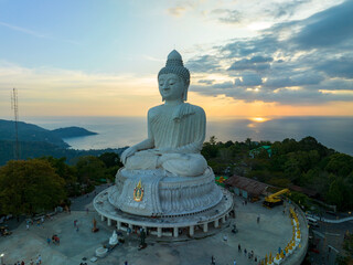 big buddha on high mountain in Phuket Thailand,Amazing light of sunset nature Landscape nature background