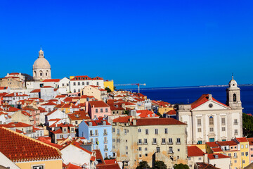 Fototapeta premium View of Alfama, the oldest neighborhood of Lisbon, from Santa Luzia viewpoint in Lisbon, Portugal