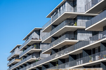 Big gray apartment building seen in Barcelona, Spain - 573769330