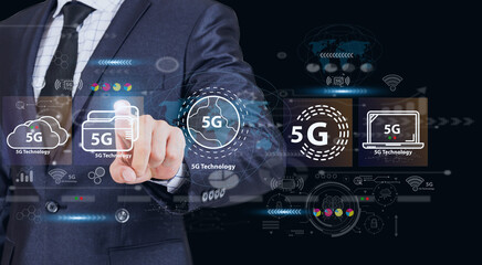 Businessman pressing on virtual screens with business digital technology future with technology link internet connection network global world wireless 5G network high-speed internet.5G technology