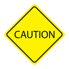 A yellow sign with caution text