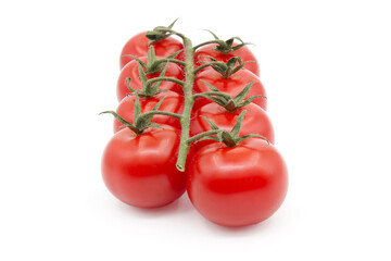 Cherry tomatoes twig isolated on white background
