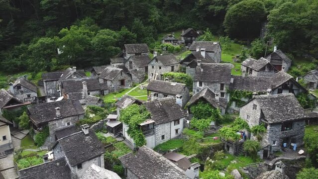 Stone village of Foroglio in mountains of Switzerland, aerial drone view