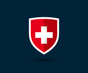 Medical shield logo with red cross. Protected guard shield icon symbol.