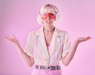 Confused, angry and portrait of a woman with fashion isolated on a pink background in a studio....