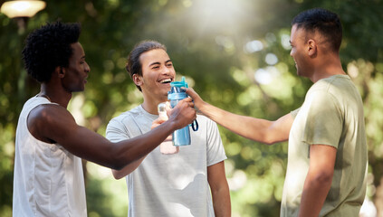 Fitness, water bottle and friends toast in nature after workout, exercise or training. Sports,...