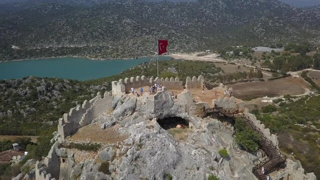 Ancient fort ruin built over cave on stone hilltop in southern Turkey
