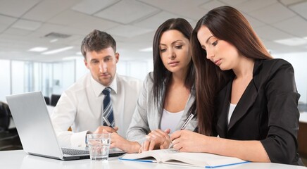 Happy business team working in an office.