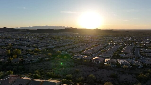 Wide aerial view of the Vistancia planned community in Peoria, Arizona during sunset.