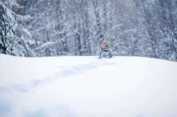 Naklejka na ściany i meble children race through the snow