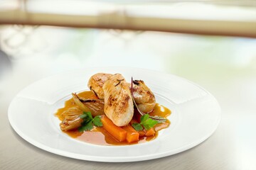 Chicken meat with tomato and salad on plate. Fastfood concept.