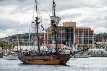 tall ships sailing, tall wooden ships on the water. at the wooden boat festival hobart