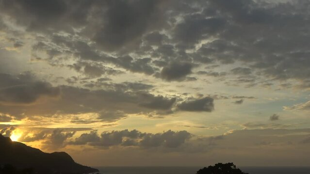 Sunset Timelapse of over the beach, golden hour sky on Mahe Island, Seychelles