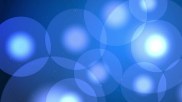 Abstract blue background with concentric circles and small particles