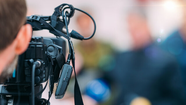 TV Camera at a Press Conference